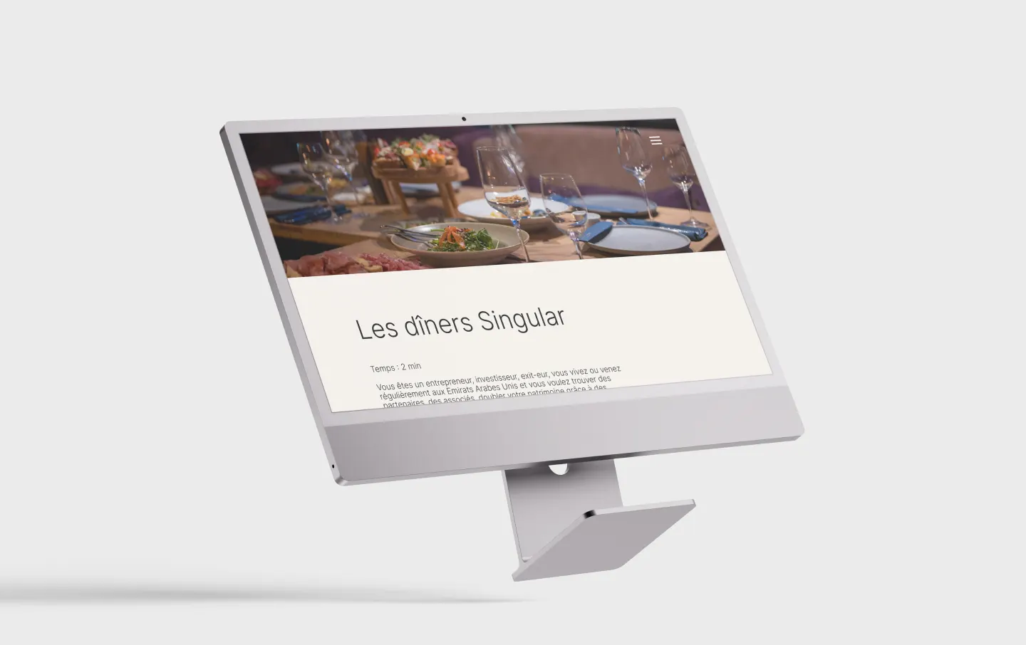 Page « Les dîners Singular » du site Singular Club affichée sur un iMac